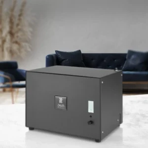 zaluti-modulair-hvac-scent-machine-interior Zaluti ModulAir scent machine placed in a modern living room interior with a blue sofa in the background.